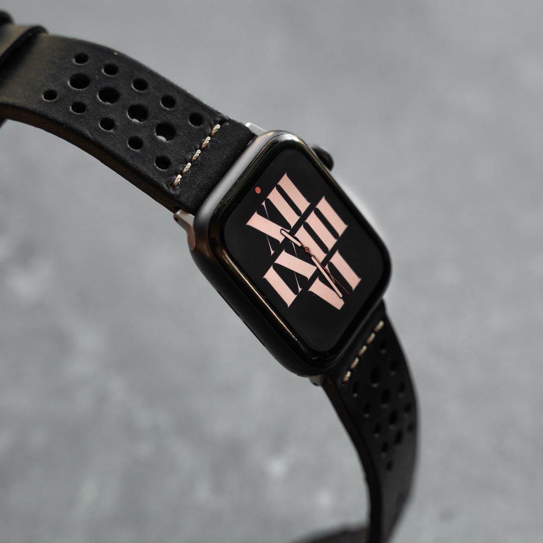 Close-up of a robust racing leather strap with detailed stitching, showcasing its durable design and high-quality craftsmanship.