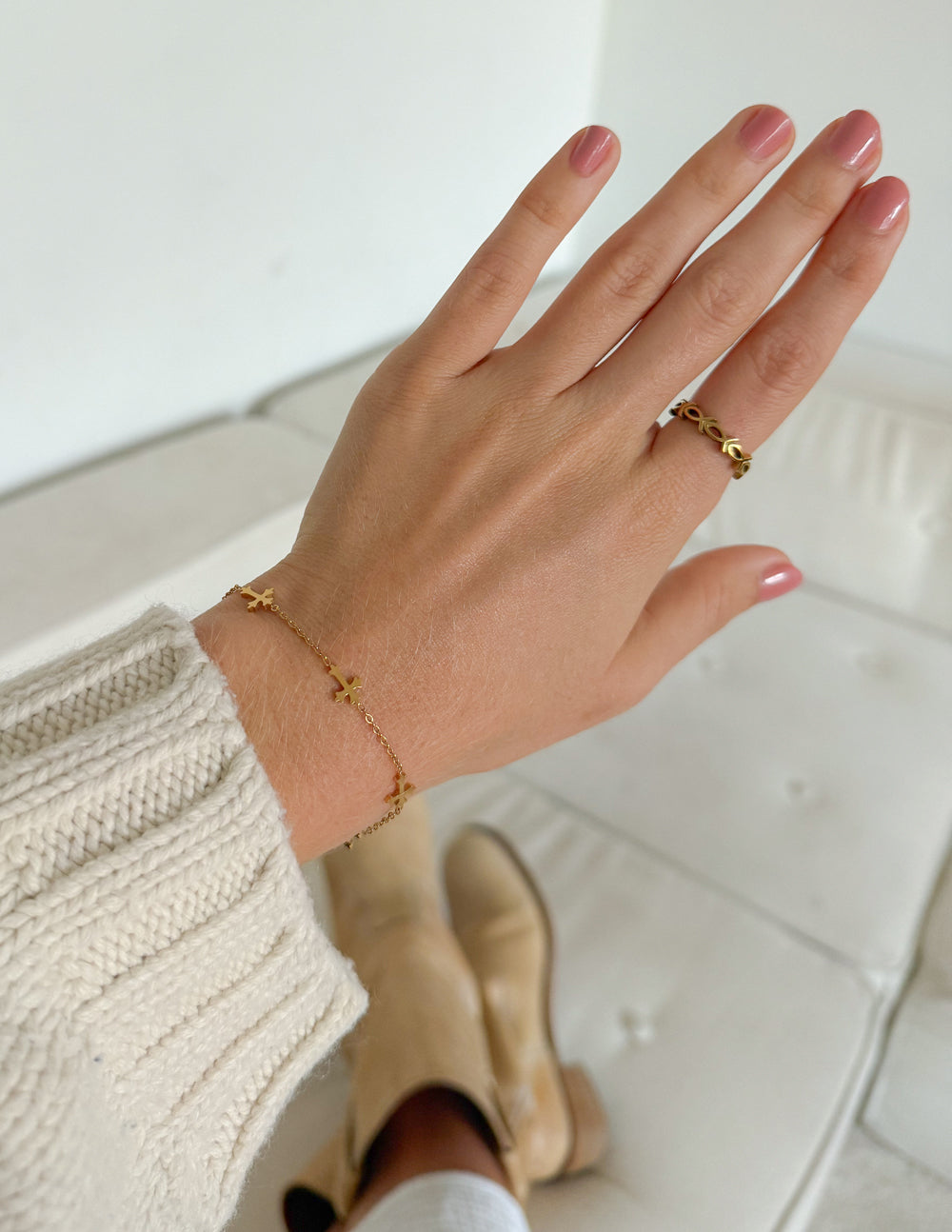 Elevated Faith cross link bracelet featuring interconnected metal links and a prominent cross charm, stylish jewelry accessory.
