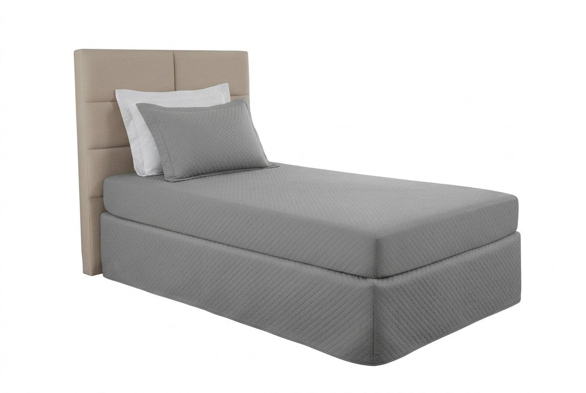 Gray Maison Charlo waterproof quilted single mattress protector, soft bedding cover with secure fit and quilted texture.