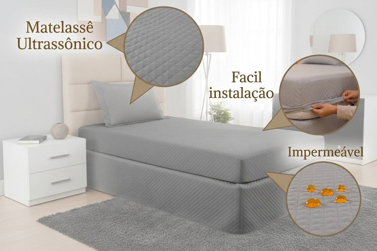 Gray Maison Charlo waterproof quilted single mattress protector on a bed, made of soft bedding fabric.