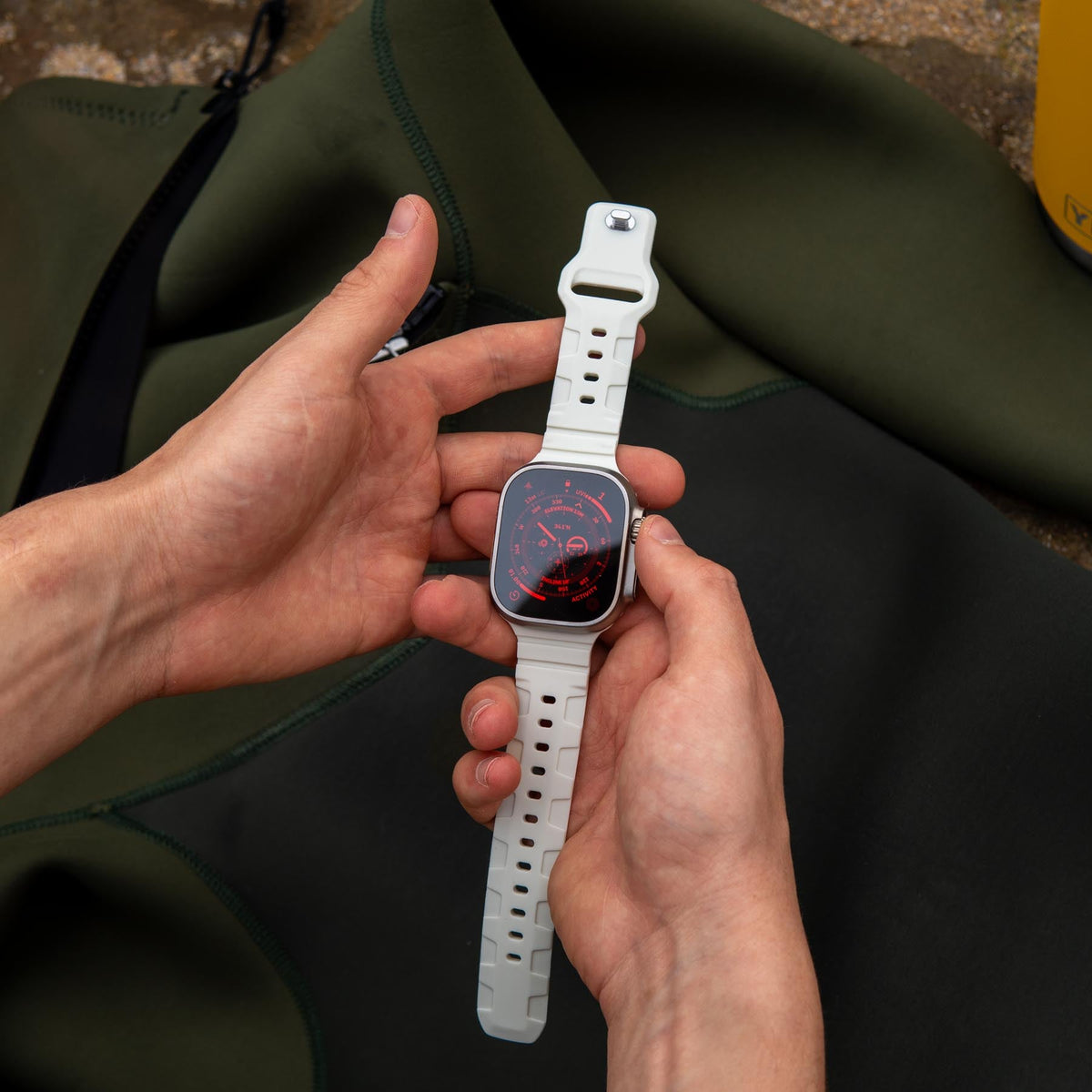 Robust sport band in vibrant color, showing adjustable strap and textured surface for comfortable active wear.