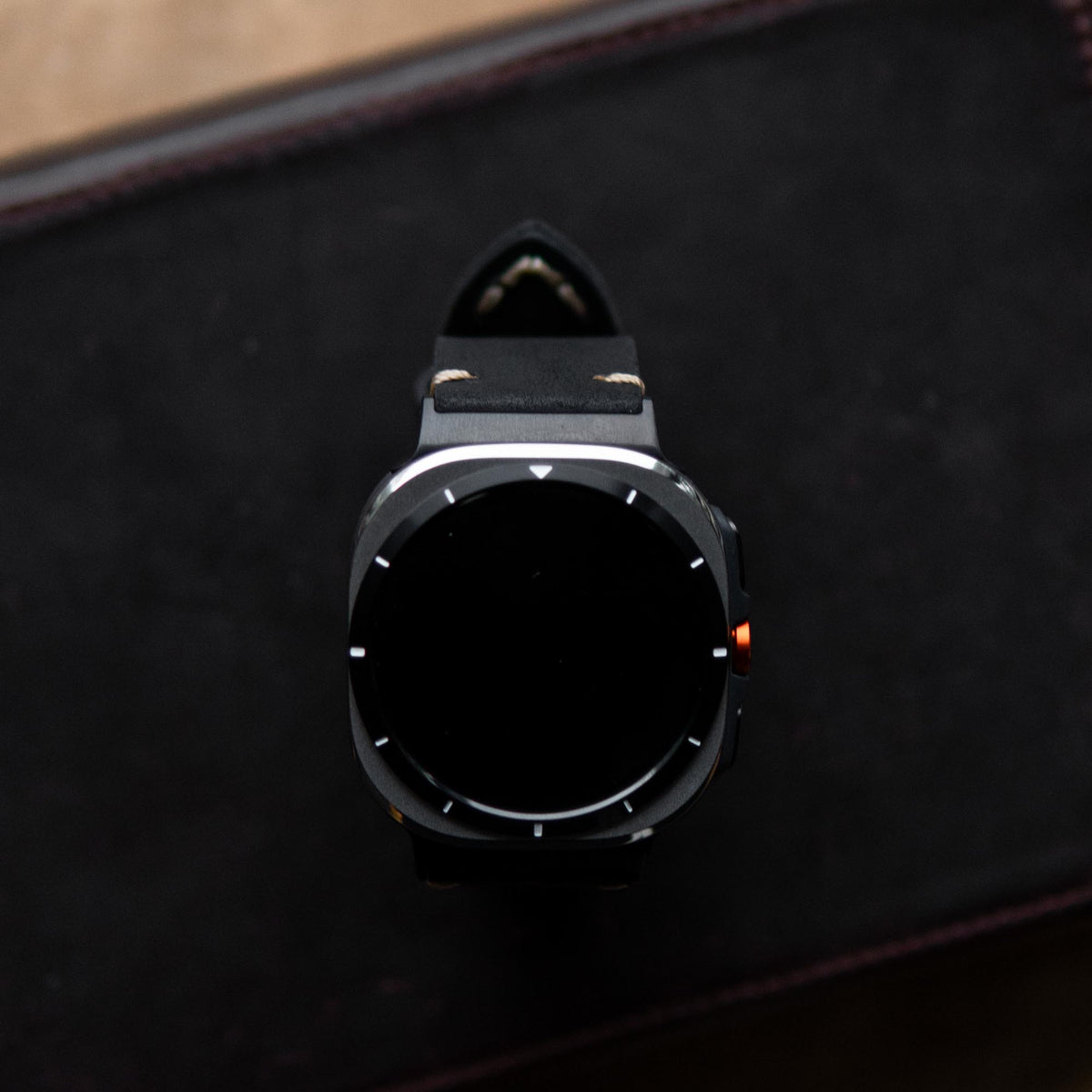 Robust Leather Strap R01 for Samsung Galaxy Watch Ultra, brown genuine leather band with stitching detail, close-up shot.