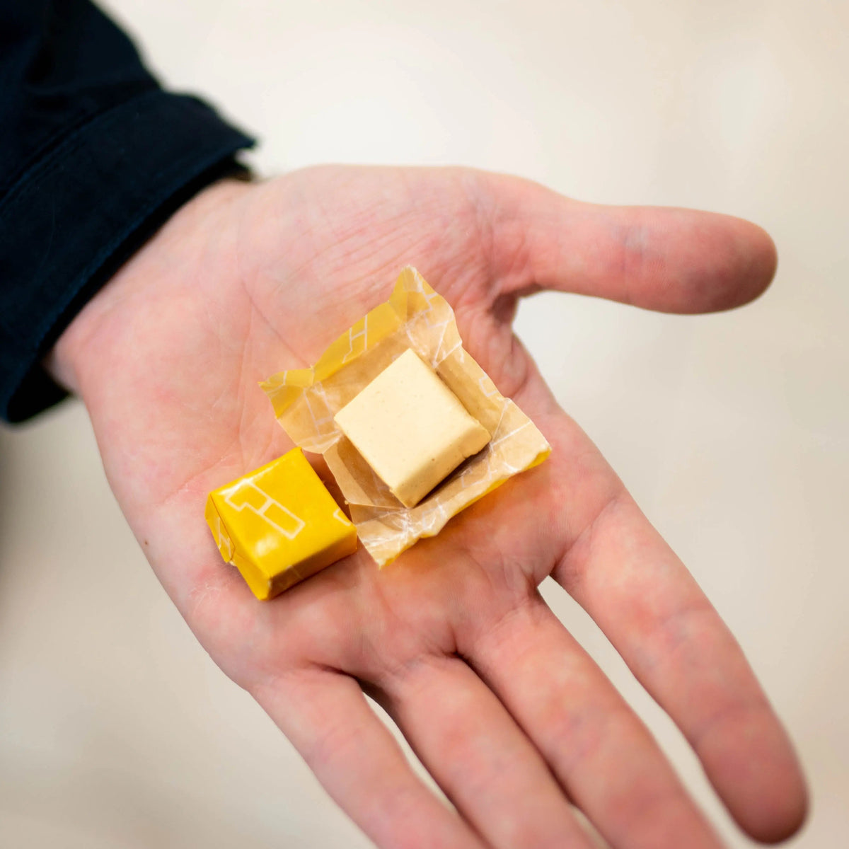 Close-up of 1 Shot Energy Energy Chews package with colorful packaging and the chews visible inside.