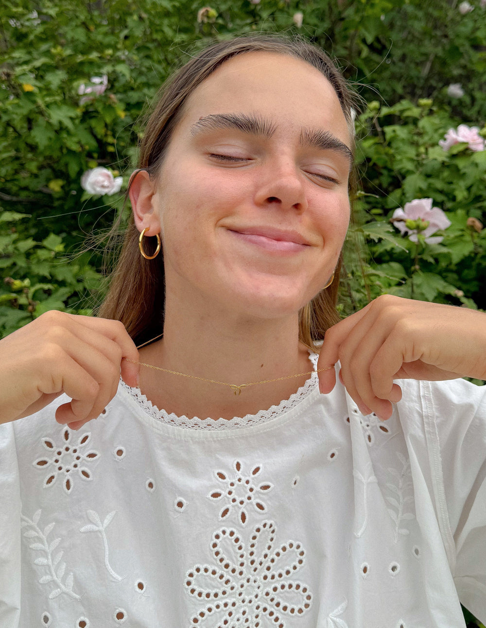 Elegant dainty bow necklace by Elevated Faith featuring a delicate chain and small bow pendant, perfect for everyday wear.