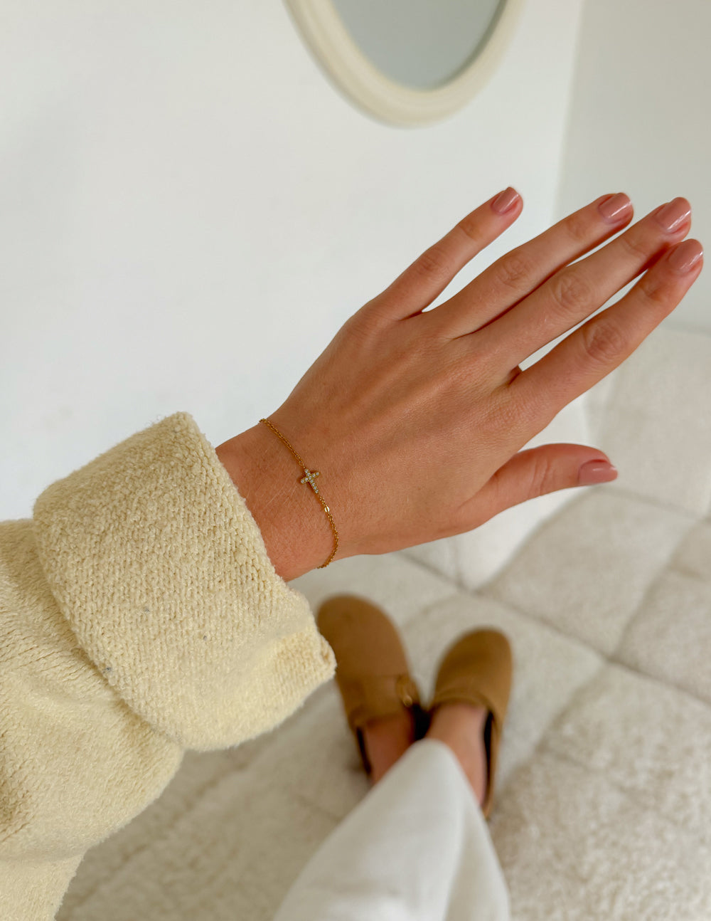 Dainty gem cross link bracelet by Elevated Faith featuring delicate chain and small sparkling cross charms.