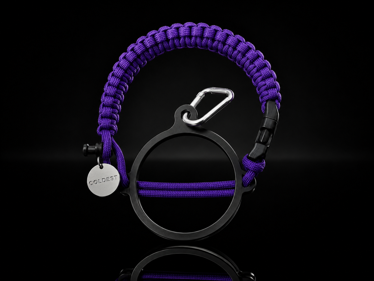 Dark purple and black Coldest Paracord handle accessory with a durable, textured design on a dark background.