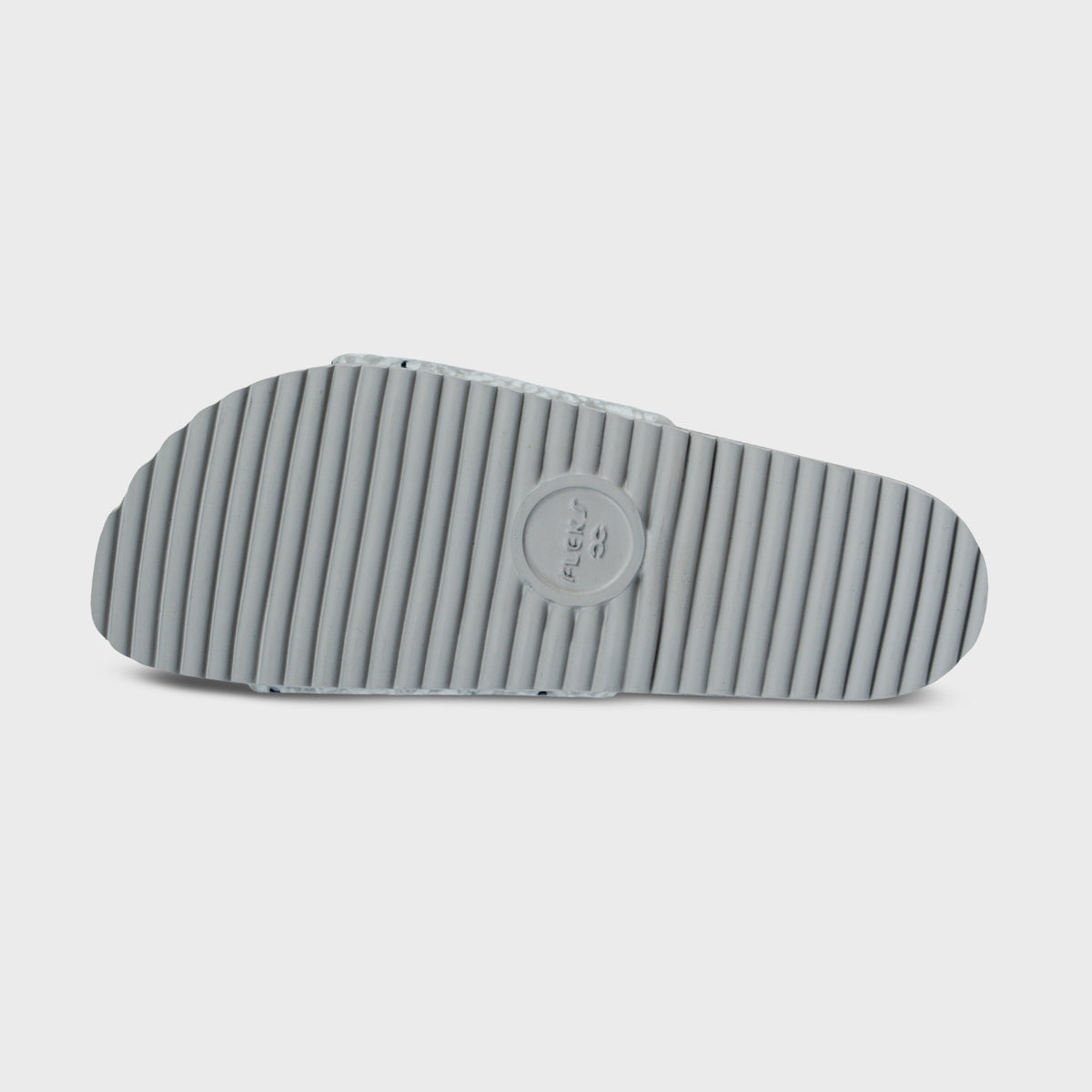 Fleks East Beach Slide in cloudy day style with rubber outsole and casual slip-on design, perfect for beach or outdoor wear.