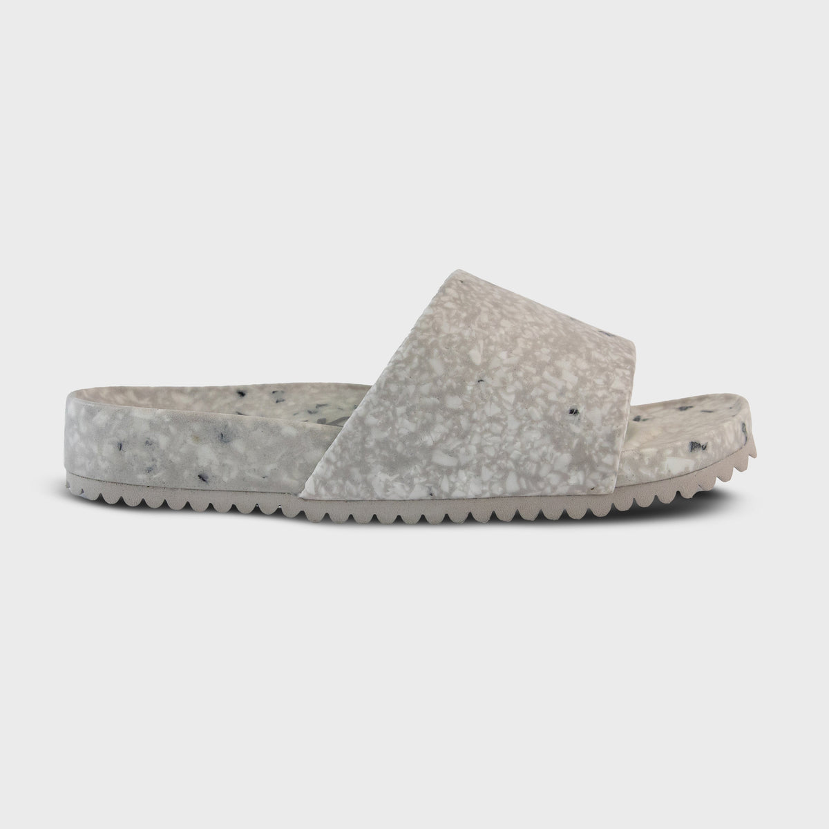Fleks East Beach Slide in cloudy day style, featuring a single profile view with comfortable slip-on design and casual beachwear look.