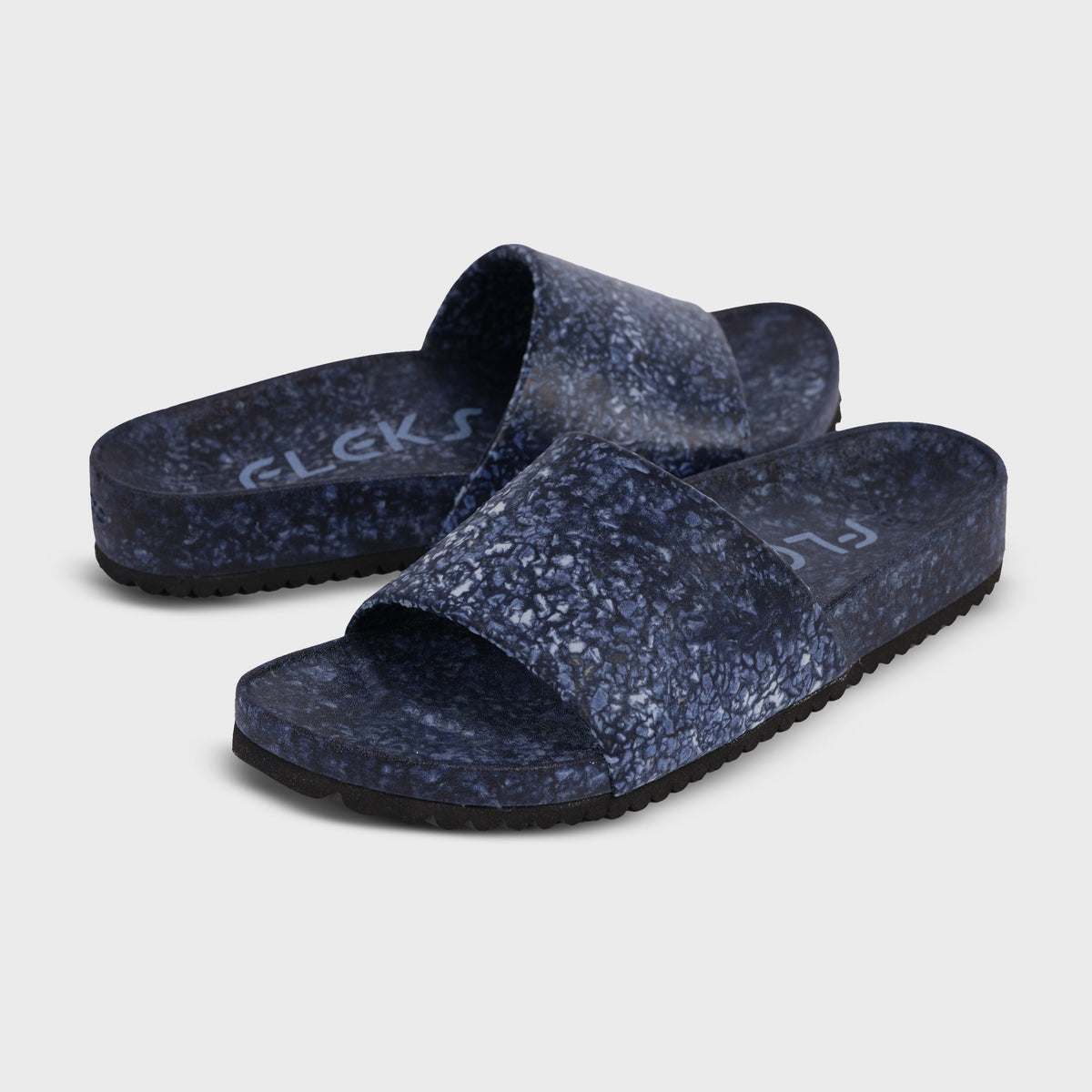 Fleks East Beach Slide in deep blue sea color, featuring comfortable slip-on design and casual style for beachwear.