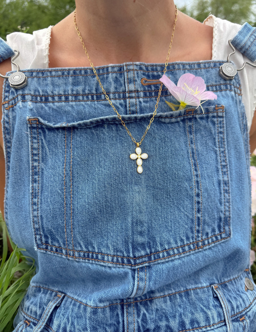 Elevated Faith Eternal Light Cross paperclip chain necklace with delicate silver links and a small cross pendant.