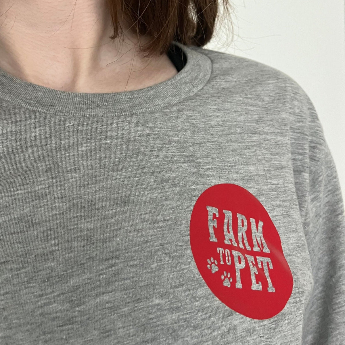 Gray Farm to Pet logo T-shirt for pets, featuring a comfortable cotton fabric and stylish farm-inspired design on the front.