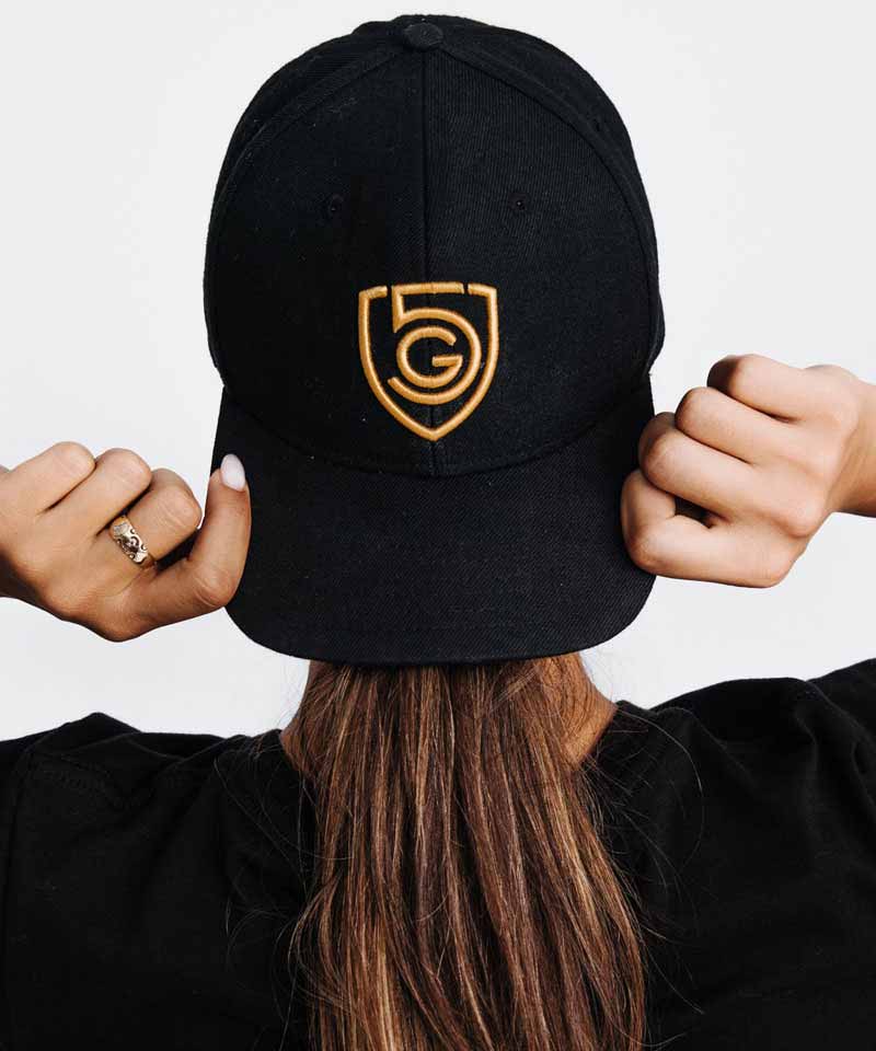 Goal Five G5 flat billed snap back hat, lifestyle style, with adjustable strap and classic design, shown on a neutral background.