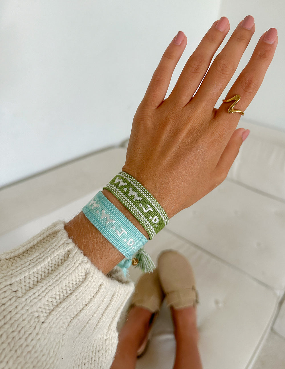 Green WWJD embroidered bracelet wristband by Elevated Faith with stitched logo and adjustable band for faith-inspired style.