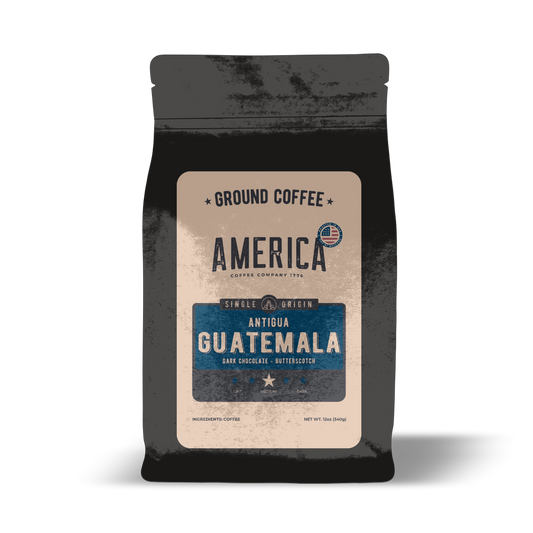 Ground Guatemala single origin coffee from America Supply Company LLC, showing rich, dark roasted beans in a bag.