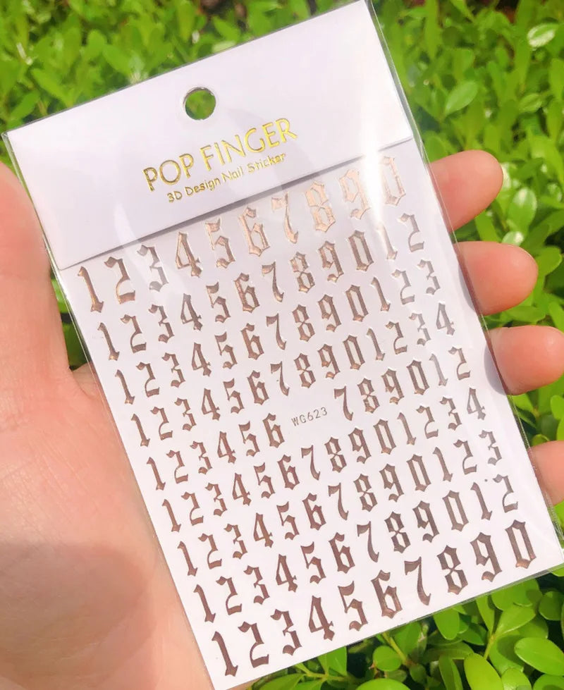 Black Old English font nail art stickers featuring alphabet letter transfers by Blushimmer for gothic nail decoration.