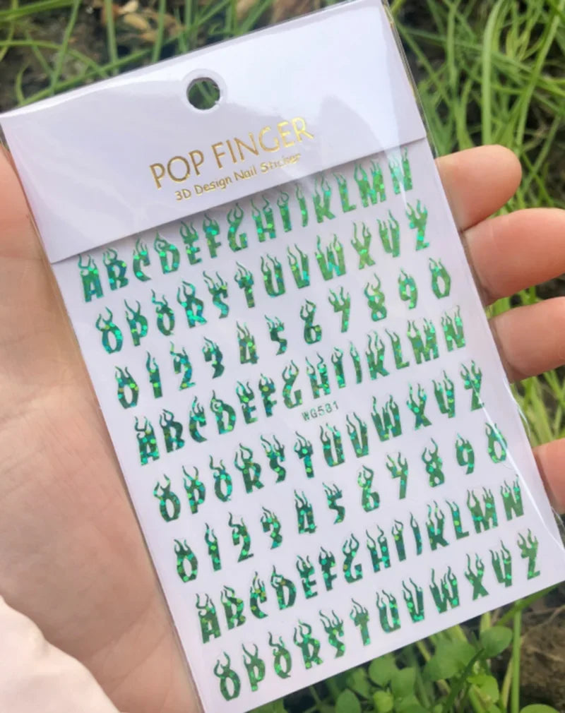 Black Gothic nail art stickers featuring Old English font alphabet letters for decorative nail decoration by Blushimmer.