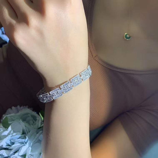 Gold iced out diamond chain bracelet for women, 18K gold with sparkling diamonds, by Don John.