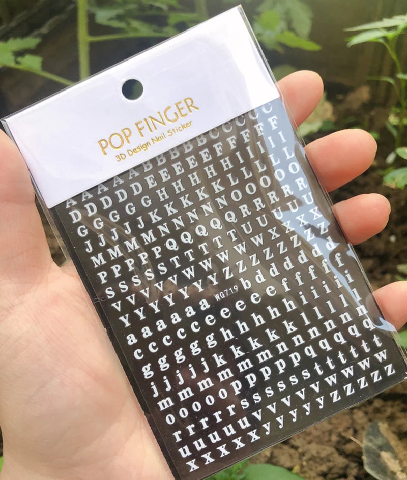 Black Old English font nail art stickers featuring alphabet letter transfers for gothic nail decoration by Blushimmer