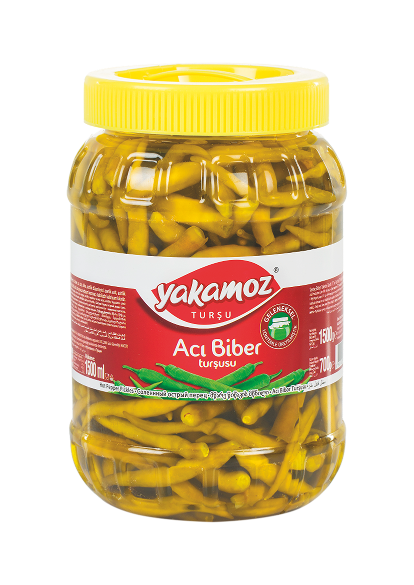 S101 Yakamoz hot pepper pickle in a clear glass jar, showcasing vibrant red hot peppers and pickle slices inside.
