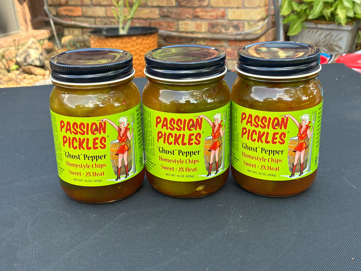 Cinderosa Ranch Passion Pickles® Ghost Pepper Homestyle Chips in a jar with slices of spicy pickles and ghost peppers.