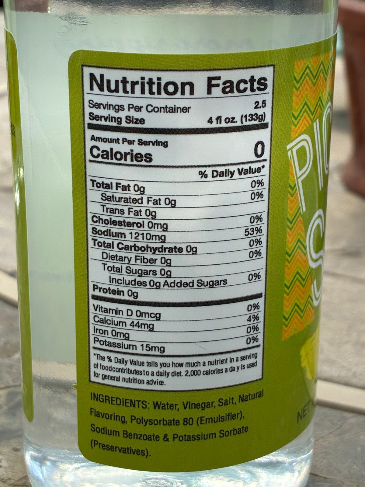 Cinderosa Ranch Pickle Sips Dill flavor in a 10 fl oz bottle with fresh dill and pickle slices visible inside.