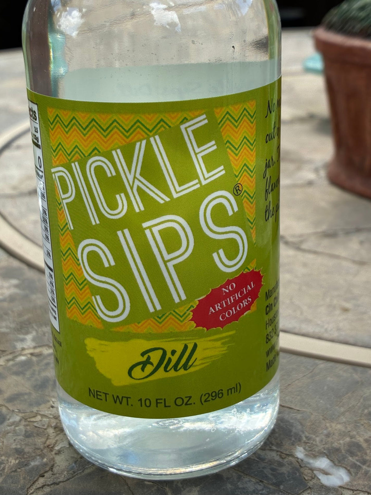 Cinderosa Ranch Pickle Sips® Dill flavor in a 10 fl oz bottle, showcasing the pickle product with a clear label on the bottle.