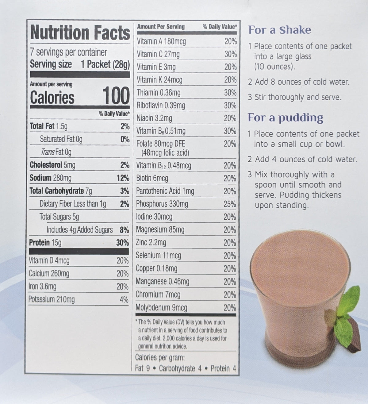 Chocolate Chill Mint Shake by AmBari Nutrition, showcasing a creamy mint chocolate shake in a clear glass with whipped topping.