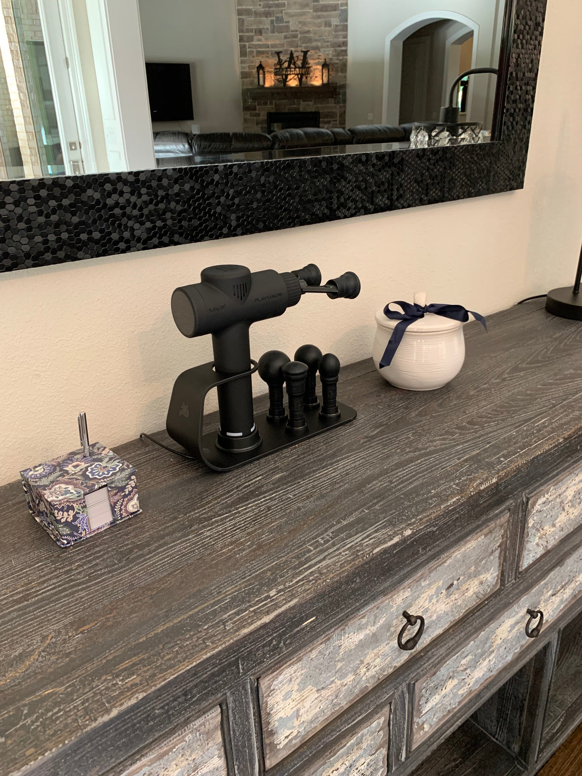 iReliev MVP+ PowerUp Charging Station for percussion massager accessories, shown with charging ports and compact design.