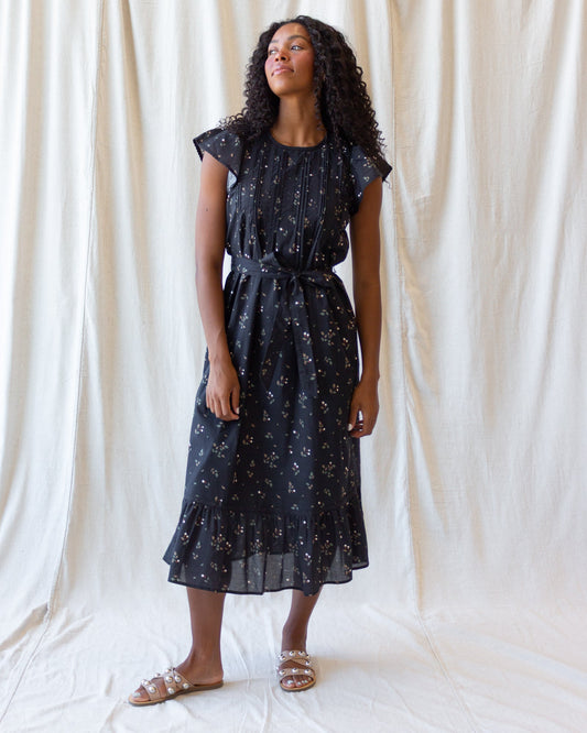 Downeast Pretty Pintuck Dress with a flowing fabric, delicate pintuck details, and a flattering silhouette.