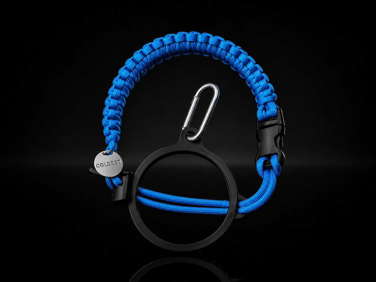 Coldest Paracord Handle accessory with blue and black paracord wrapped around a sturdy handle on a dark background.