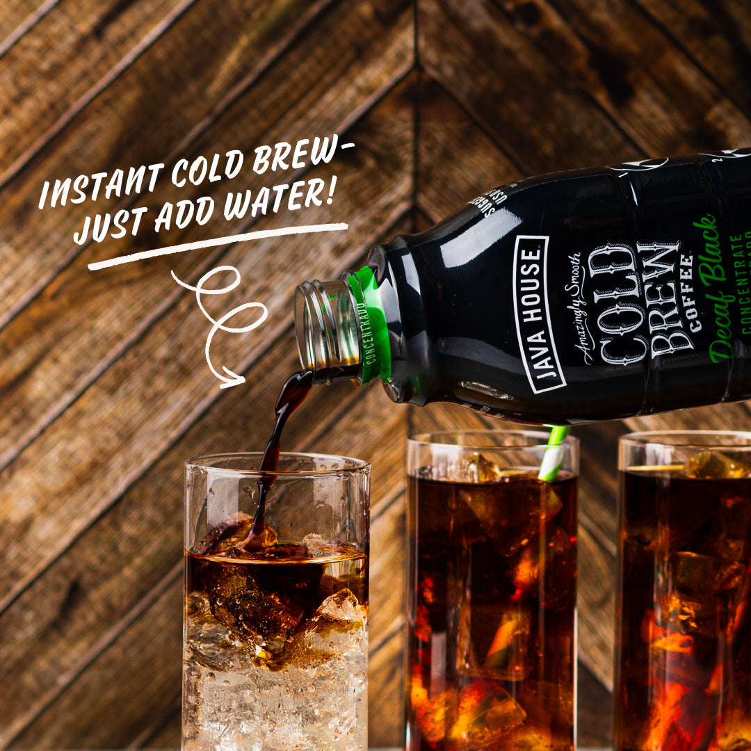 Decaf cold brew coffee concentrate by Java House in a 32oz bottle, with a rich dark color and label visible.