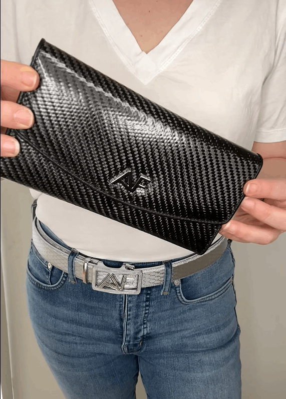 Assure Fashion women's designer wallet in sleek carbon color, featuring multiple card slots and a secure coin compartment.