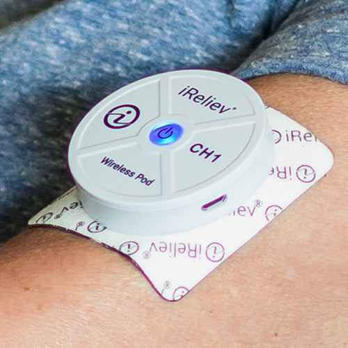 iReliev wireless small pads refill kit with replacement adhesive pads for TENS and EMS pain relief devices in a lifestyle setting