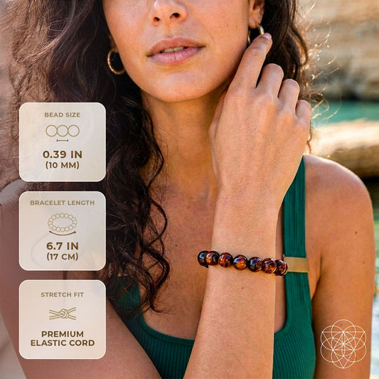 Mahogany obsidian bracelet from Conscious Items featuring a polished mahogany-colored stone on a sleek bracelet.