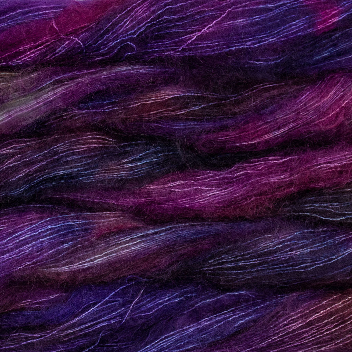 Soft Malabrigo Mohair Yarn from Darn Good Yarn, showing the fluffy, luxurious fiber in natural shades.