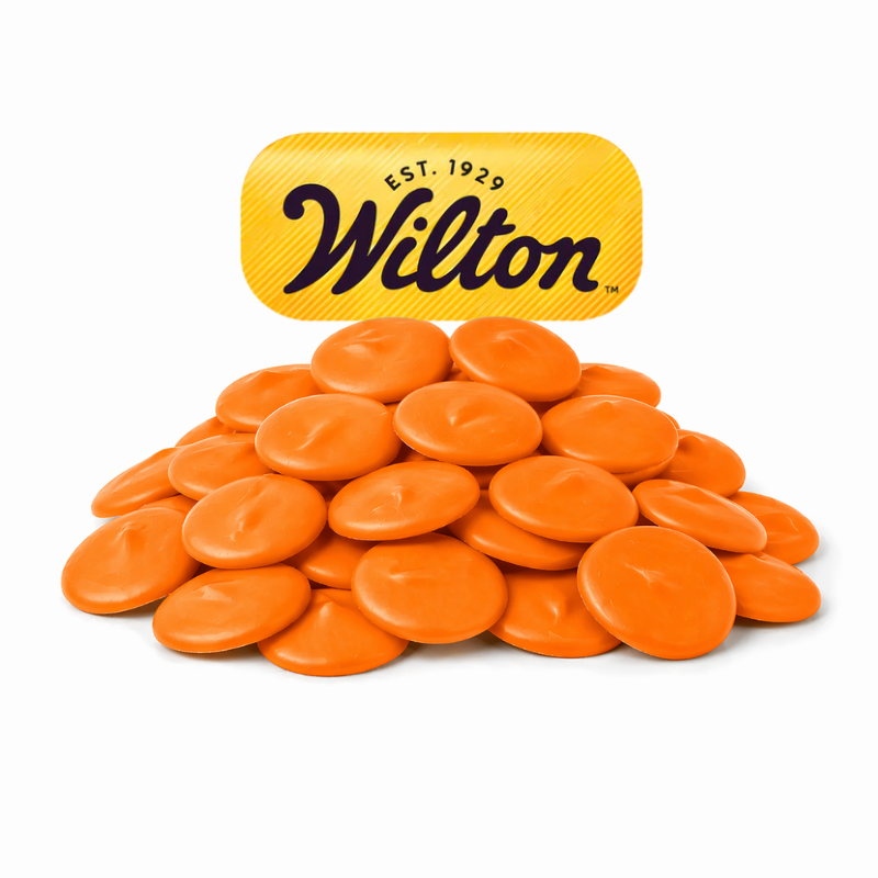 Orange Wilton confectionery melting wafers by Candy In Bulk, perfect for chocolate coating and decorating treats.