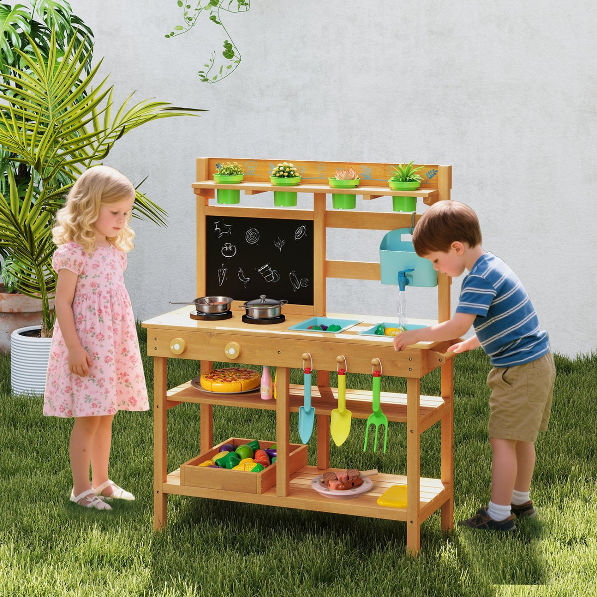Outdoor pretend kitchen for children with faucet and removable sinks, ideal for outdoor play and imaginative cooking fun.