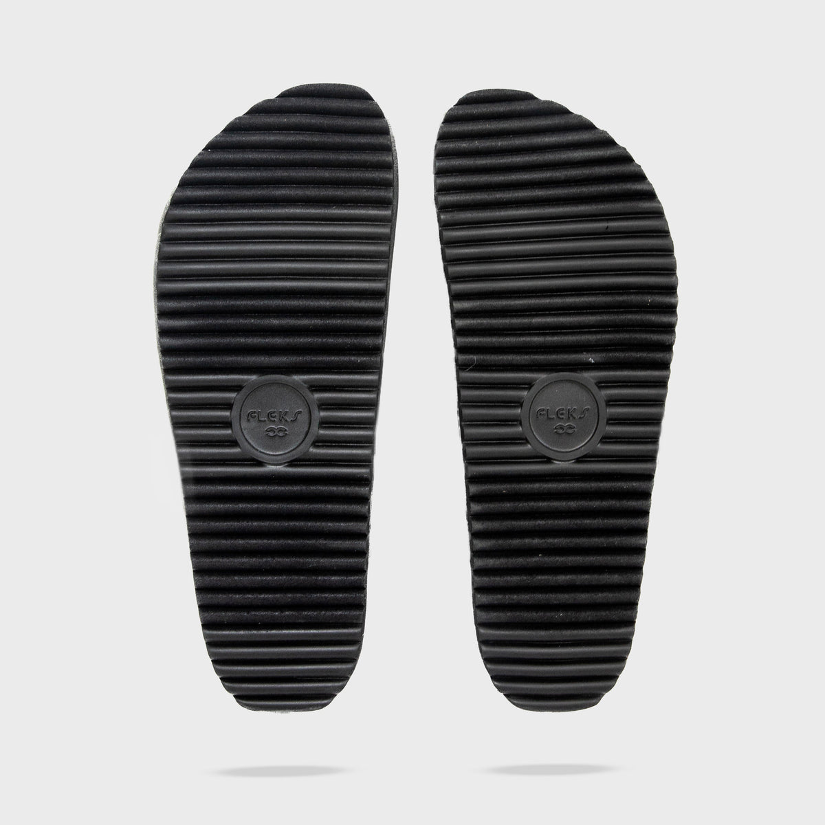 Fleks More Mesa Clog in After Dark showing the durable rubber outsole and stylish design, perfect for casual wear.