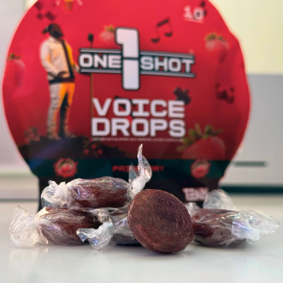 Unwrapped Painberry Voice Stack bundle from 1 Shot Energy, featuring drops with vibrant Painberry flavor and packaging.