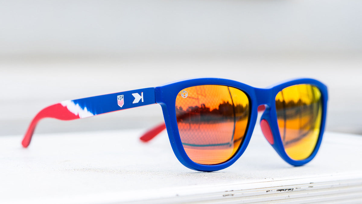 U.S. Soccer 2024 Knockaround sunglasses by Goal Five, stylish lifestyle eyewear with sporty design and black frames.
