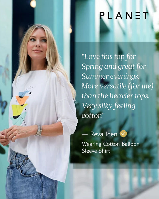 Reva Iden wearing a PLANET by Lauren G Pima Cotton Mid Century Luxury Boxy T-Shirt, shown on a model with a casual style.