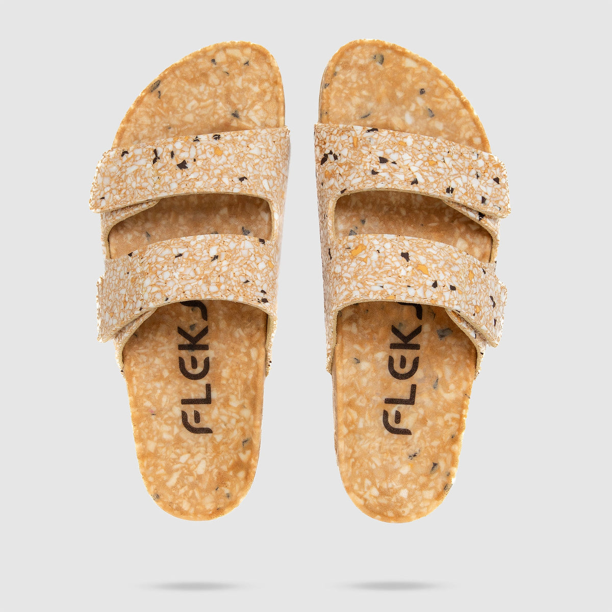 Top-down view of Fleks Riviera Sandal in Morning Coffee color showing the strap design and shadow details.