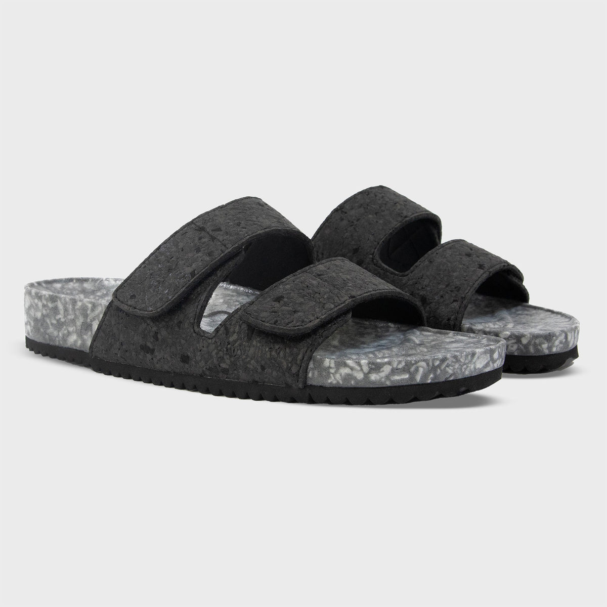 Pair of Fleks Riviera Sandals in Nightfall color, showing side profile with straps and sole detail.