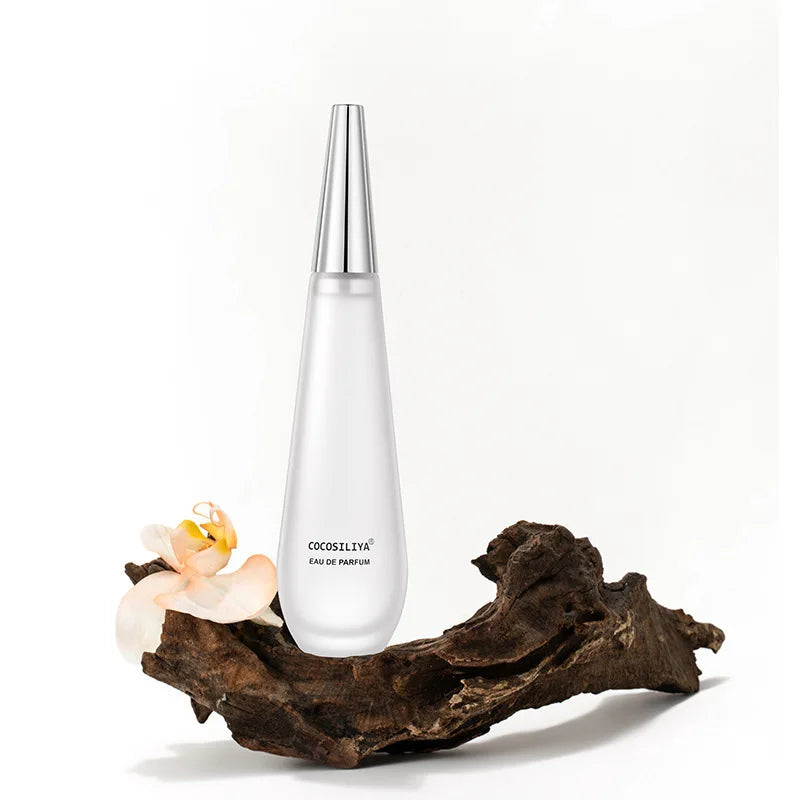 Elegant 100ml women's floral eau de parfum by Blushimmer featuring lotus, rose, peony, amber, musk, and woody notes.