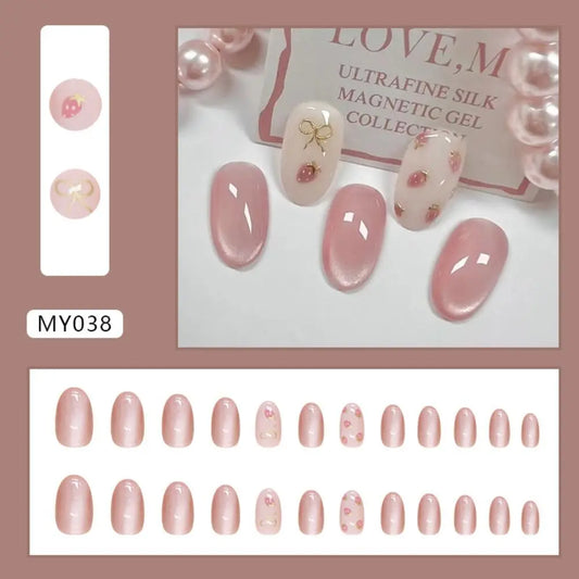 Set of 24 oval false nails by Blushimmer featuring French, strawberry, butterfly, and cat eye designs for DIY manicure.