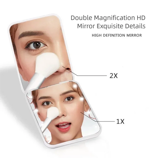 Blushimmer compact folding makeup mirror with 8 LED lights, 2x magnification, portable design, battery-powered.