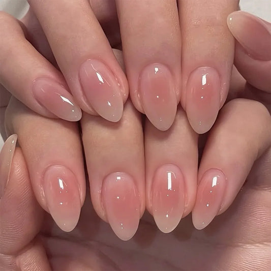 Set of 24 Blushimmer metallic cat eye French manicure tips in nude pink with textured 3D acrylic almond press-on false nails.