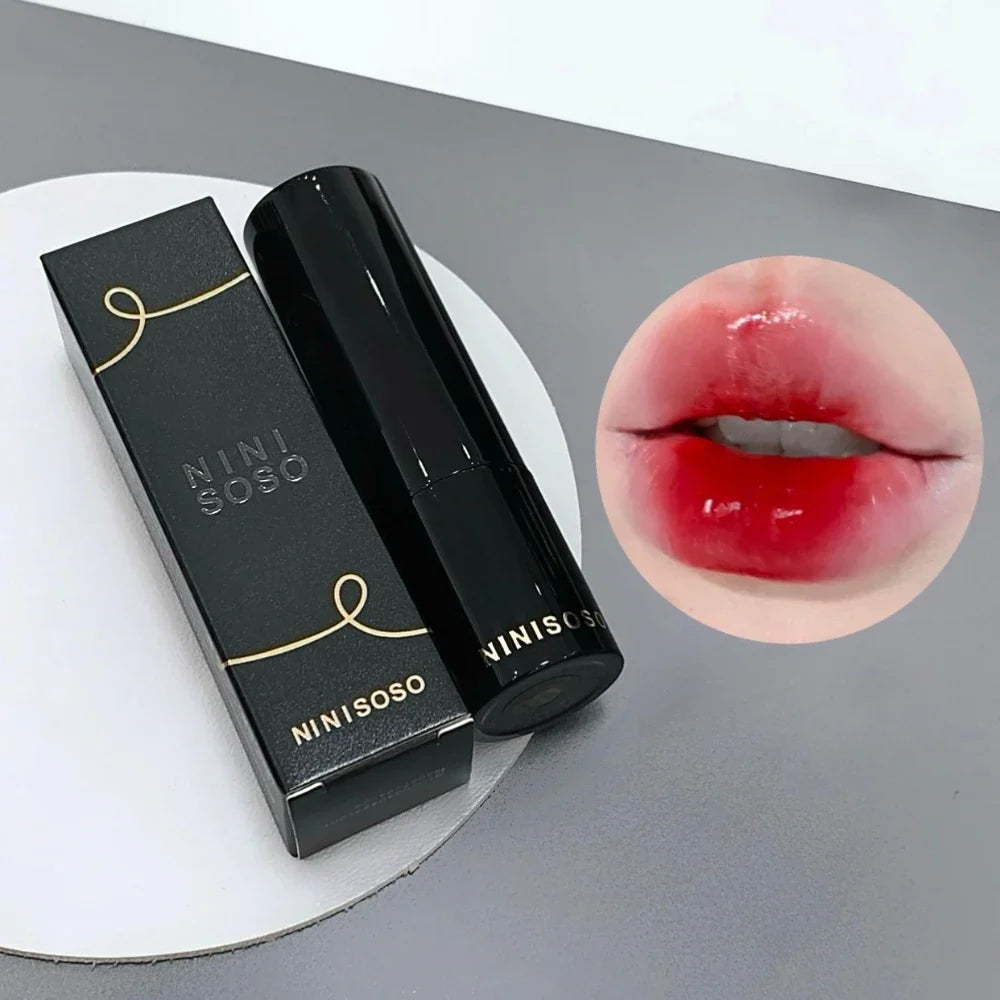 Glossy mirror lipstick in red brown shade by Blushimmer, showing the moisturizing, waterproof, long-lasting lipstick with a shiny finish.