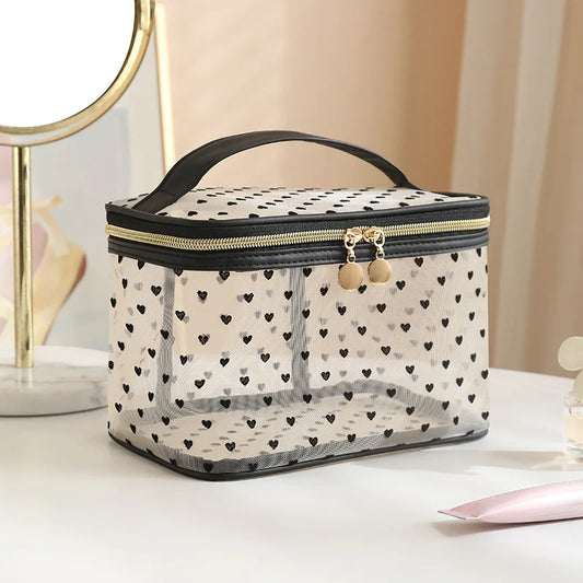 Black mesh cosmetic bag by Blushimmer, double-layer travel makeup case with large capacity and zipper storage pouch.