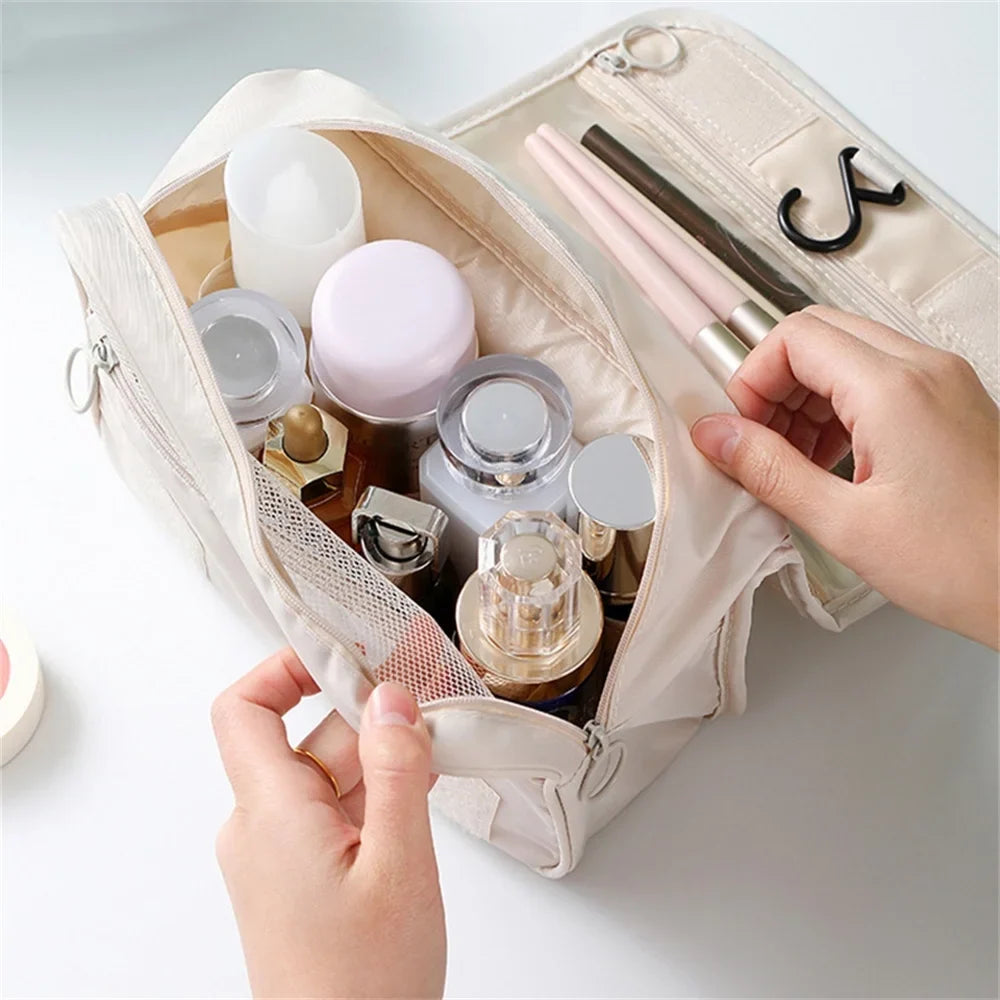 Large waterproof Blushimmer travel cosmetic bag with hanging hook, portable toiletry washbag, suitable for female bathroom storage and makeup.